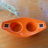 Vintage oranje peper en zoutstel van plastic