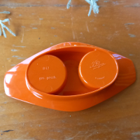 Vintage oranje peper en zoutstel van plastic