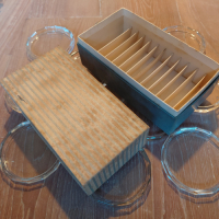 Doosje met glazen onderzetters