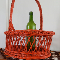 Vintage rieten flessenmand