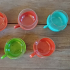 Glazen theekopjes met plastic houder van Melitta