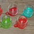 Glazen theekopjes met plastic houder van Melitta