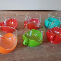 Glazen theekopjes met plastic houder van Melitta