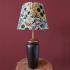 Lamp met vintage keramieken voet en Afrikaans motief