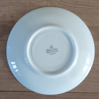 Vintage kop en schotel met bloemmotief