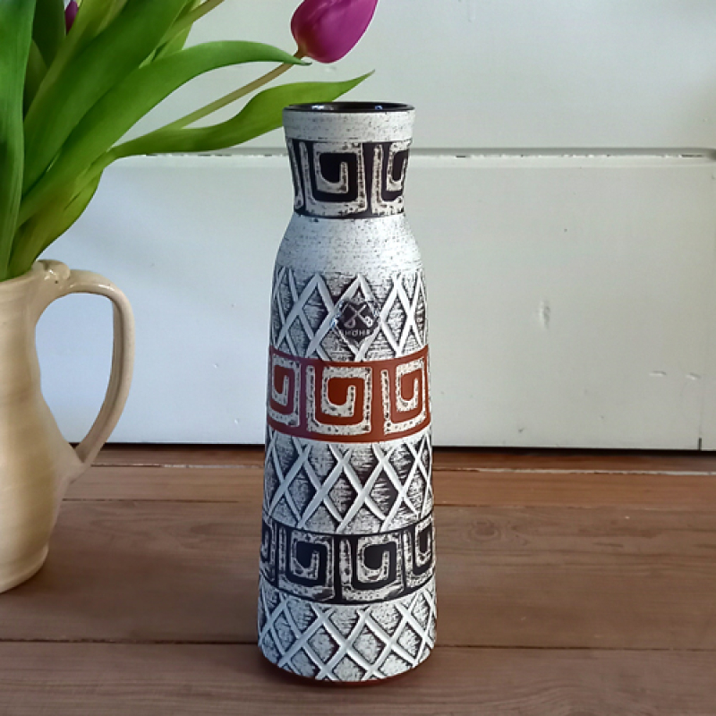 Vintage vaasje W. Germany met diverse vormen en figuren