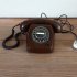 Vintage chocoladebruin telefoontoestel met draaischijf