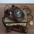 Vintage chocoladebruin telefoontoestel met draaischijf