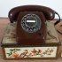 Vintage chocoladebruin telefoontoestel met draaischijf