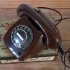 Vintage chocoladebruin telefoontoestel met draaischijf