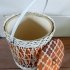 Vintage rieten mand met bloemmotief