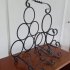 Vintage metalen wijnrek met gedraaide vormen