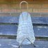Vintage glazen onderzetters in metalen houder